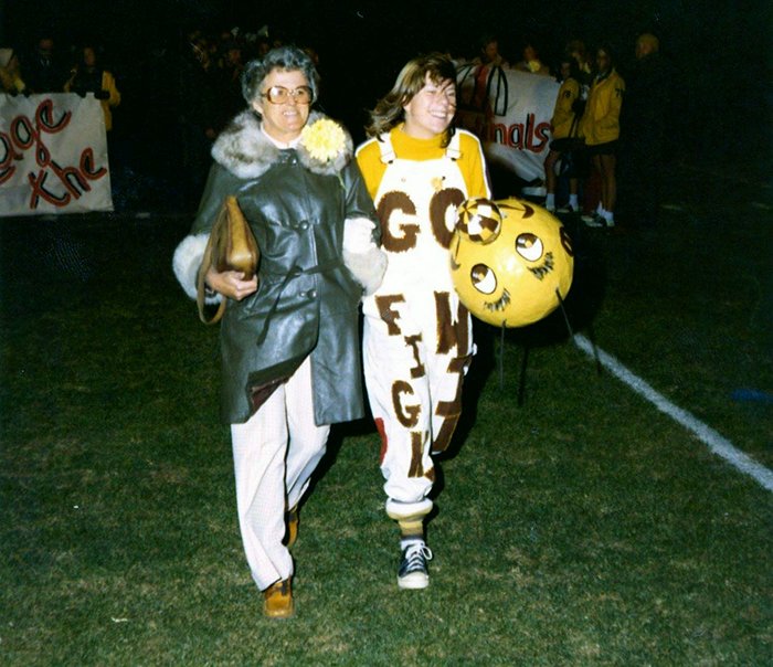 (circa 1975): Gwen Schellentrager Johnson ('76) escorted by her Mother during Senior Night at one of the fall football games. Gwen's enthusiasm and gymnastic skills made Arcy come alive in the mid-70's.